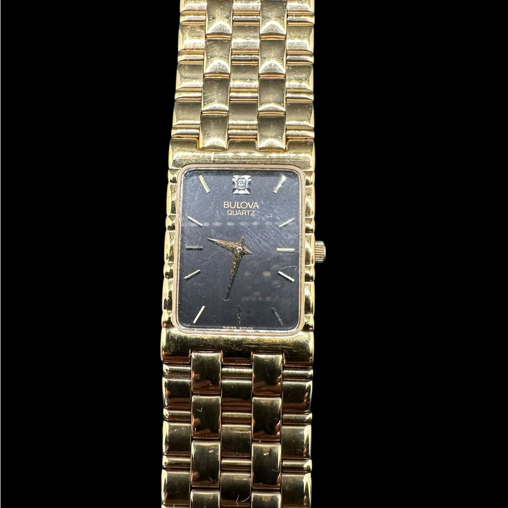 Bulova Gold-Tone Men's Quartz Dress Watch - Black Dial. New old stock. Unused